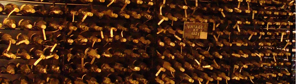 Bottles of port laid down to demonstrate your taste and probity