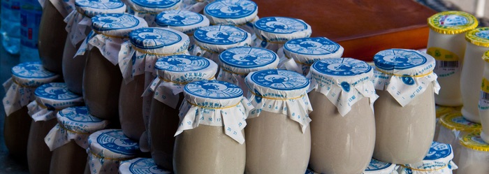 stacked yoghurt pots at a market in Beijing