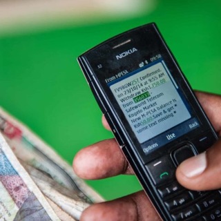 Mobile phone showing cash transfer withdrawal